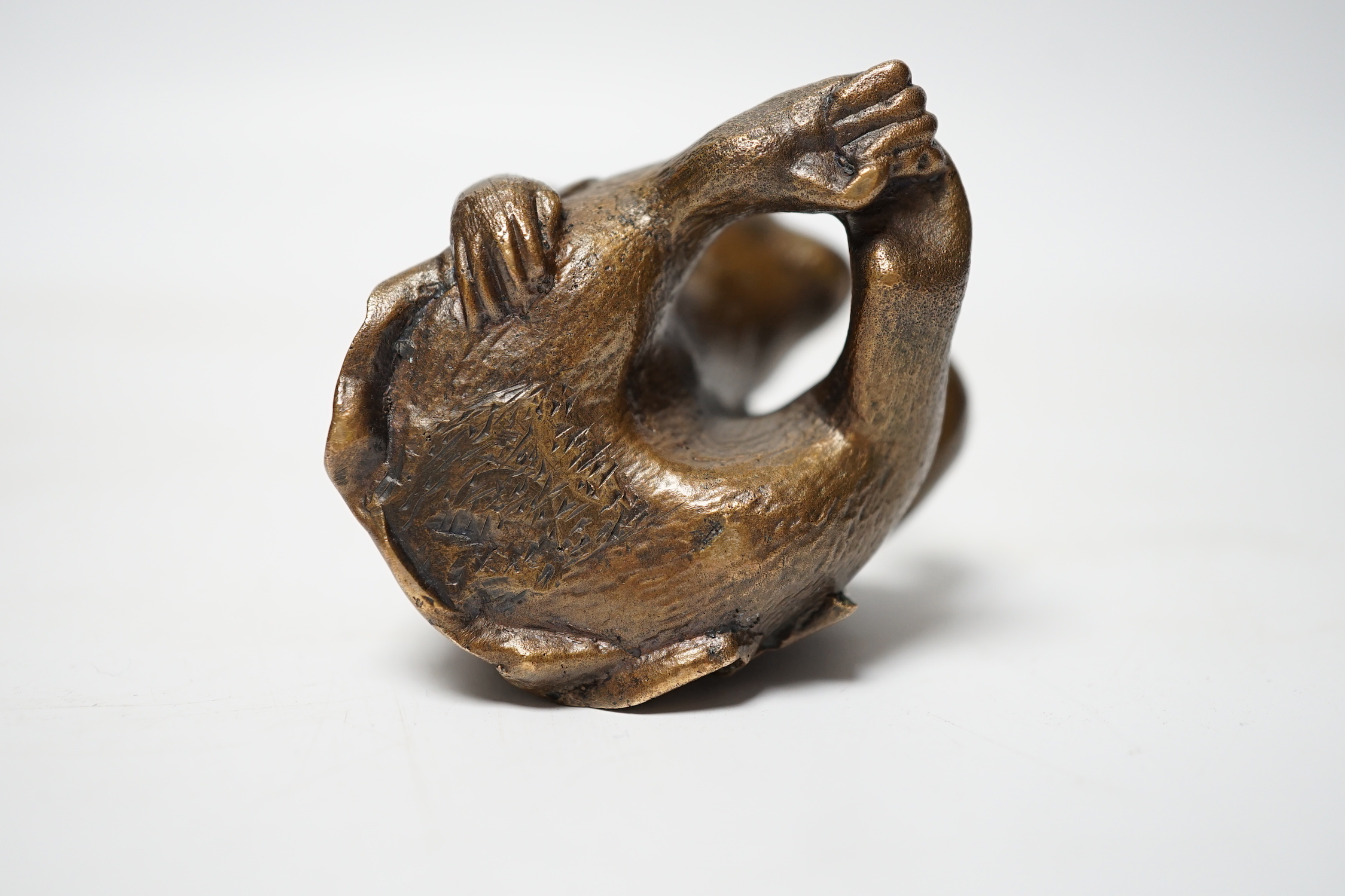 A Japanese bronze model of a monkey, 19th century, 5.5cm high